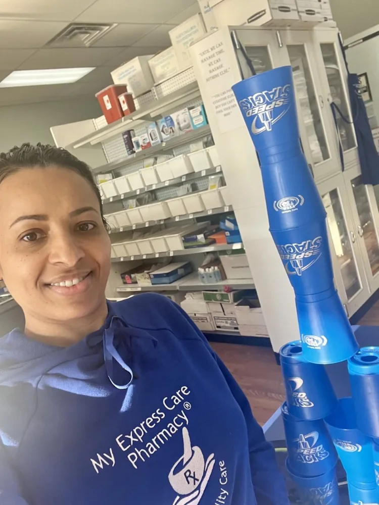 Team member smiling in the pharmacy