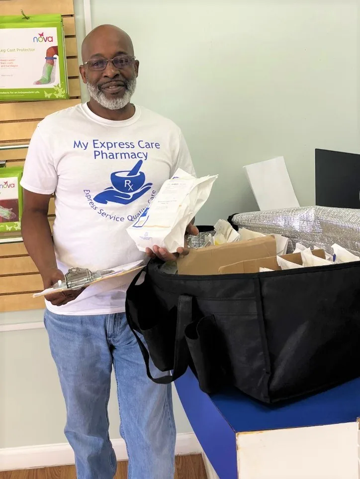 Delivery team member with a delivery bag