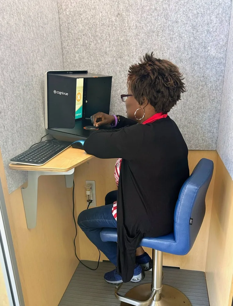 Team member at the pharmacy computer
